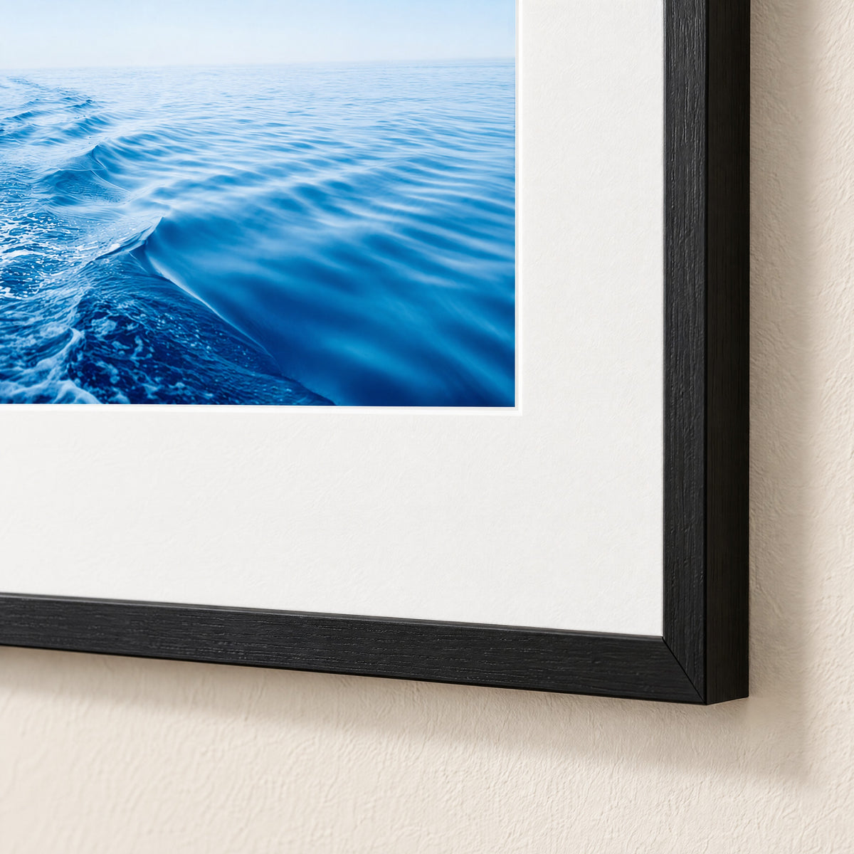 Close-up of the black frame and white mat on Silky Blue
